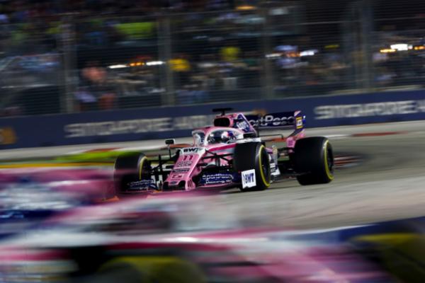 Dejan Checo Pérez y Lance Stroll Marina Bay sin sumar puntos